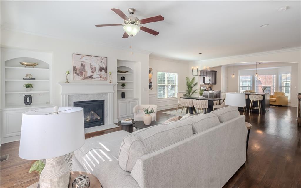 Welcome to your dream home in Smyrna! This beautifully designed end unit 3-story townhome offers the perfect blend of space, elegance, and location. With 4 generously sized bedrooms and 3.5 bathrooms, this residence delivers the comfort and versatility today's homeowners desire.
Step inside to discover a bright and open floor plan that seamlessly connects the living, dining, and kitchen areas—ideal for both everyday living and hosting friends and family. The chef-inspired kitchen is a true centerpiece, featuring sleek stainless steel appliances, granite countertops, a spacious island, bay window to sit at and enjoy coffee or meals, and abundant cabinetry that effortlessly combines function and style.
The spacious living room invites you to unwind in comfort, while large windows fill the home with natural light. A private balcony just off the main level provides the perfect setting for entertaining, grilling or winding down in the evening. Off the living room, you will have a built in desk, perfect to use as a work or homework station.
On the upper level, retreat to the luxurious primary suite complete with a spa-like en-suite bath including dual vanities, a soaking tub, and a separate glass-enclosed shower. The custom walk-in closet provides ample storage. Two additional bedrooms on this level are perfect for family, guests, or additional office space.
Downstairs, you’ll find the fourth bedroom with its own full bathroom—a fantastic option for a guest suite, in-law space, private office or playroom!
This townhome also offers the convenience of a 2-car garage, and being part of a well-maintained community means you’ll enjoy beautiful landscaping and a low-maintenance lifestyle.
Located in a highly desirable area of Smyrna, this home places you just minutes from all the action—The Battery Atlanta and Truist Park are 7 minutes away, offering year-round entertainment, dining, and sporting events. Love the outdoors? You’ll be close to the Silver Comet Trail, numerous parks, and green spaces perfect for walking, jogging, or biking. The community pool is another great feature to enjoy in the Summer.
In addition to its unbeatable location, West Village is steps away and you’re surrounded by local shops, charming boutiques, and a wide array of restaurants—from cozy cafés to upscale dining. Easy access to I-285 and I-75 makes commuting a breeze and keeps you connected to all that Metro Atlanta has to offer.
Whether you're seeking modern elegance, functional space, or an unbeatable location, this Smyrna townhome checks every box. Don’t miss your chance to make this exceptional property your new home!