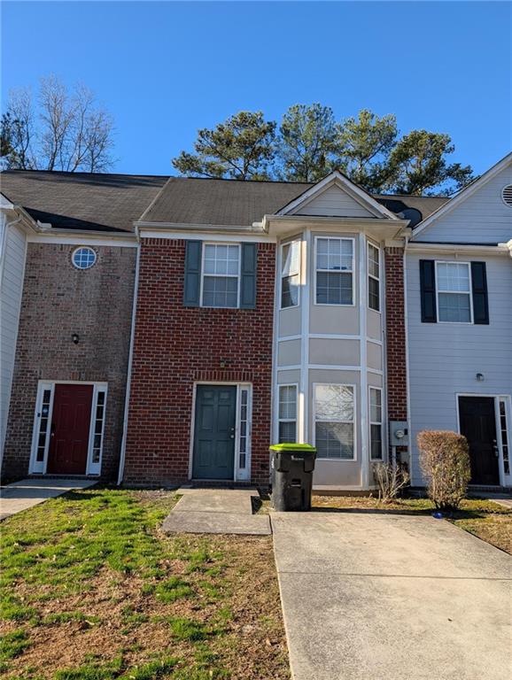 Step into this cute freshly painted thru out townhome. Livingroom has open concept to kitchen and dining area. Off of dining area has door to patio back yard. Half bathroom downstairs for your guest. Upstairs has new carpet with 2 bedroom, each with a private bathroom and walk in closets! Won't last. This home will go FHA, VA, Conventional or cash. No rental restrictions.