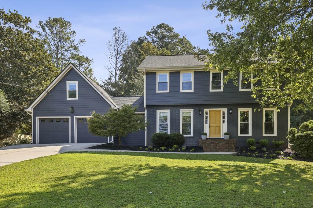 Entertainer's Dream Home with Resort-Style Backyard Oasis in Mountain Creek! Fully Updated with a Large Pool, Covered Back Patio, and Located in the Heart of Roswell with Top-Rated Schools and Convenient Access to Downtown. The Curb Appeal immediately shines with a Dark Blue Painted Exterior, Flat Grassy Front Yard, Mature Trees, and Gorgeous Landscaping. Inside, find Hardwood Floors, Crown Molding, and Thoughtful Updates throughout. To your right, a Spacious Formal Living Room doubles as the perfect Home Office or Flex Space. To your left, a Large Formal Dining Room with Big Windows sets the stage for Family Meals and Holiday Gatherings. The Chef's Updated Kitchen showcases Top-of-the-Line Stainless Steel Appliances, Granite Countertops with a Large Island, White Cabinets, and a Chic Backsplash. A Cozy Breakfast Nook framed by Oversized Windows overlooks the backyard retreat. Flowing seamlessly, the Family Room boasts a Brick Fireplace, Custom Built-Ins, and Direct Access to the Covered Patio, Pool, and Beyond. A Powder Room, Spacious Laundry Room, and Functional Mudroom complete the main level. Upstairs, the Primary Suite features Hardwood Floors, a Newly Customized Wall of Closets, and a Renovated Spa-Like Bathroom with a Modern Wooden Vanity, Glass Shower with Teal Glossy Porcelain Tile, and Brass Fixtures. Three Additional Bedrooms and a Full Bathroom with Double Sinks complete this level, including one Bedroom with a Custom Study Nook perfect for homework. A Separate Staircase leads to the Upper Bonus Room - an ideal Playroom, Media Room, or Game Room. Now for the Showstopper - the Backyard Oasis. Step outside and discover a private retreat designed for relaxation, play, and endless entertaining. A Covered Patio with Room for Dining and Lounging is perfect for morning coffee or al fresco dinners. The Deep-Water Swimming Pool invites you to cool off all summer long, while a dedicated Basketball Court and Grassy Yard keeps everyone active and entertained. Whether you're hosting a pool party, enjoying a quiet evening by the water, or creating lifelong memories with family and friends, this backyard delivers a lifestyle you'll never want to leave. With a Two-Car Garage and an Additional Garage Shed that can be transformed into a Workshop, Game Room, or Studio, the possibilities are endless. Residents of Mountain Creek enjoy Resort-Style Amenities including an Olympic-Sized Swimming Pool with Swim Team, 4 Tennis Courts, Pickleball, Playground, and a 3-Seasons Pavilion with Grills and Outdoor Heaters for cool fall nights. Year-Round Community Events bring neighbors together. All this within the Highly-Rated Pope High School District, with Easy Access to Downtown Roswell Shops and Dining, Local Parks, and Major Highways. Convenient to Kennesaw State, Downtown Woodstock, and Alpharetta. This is more than just a home it's a lifestyle.