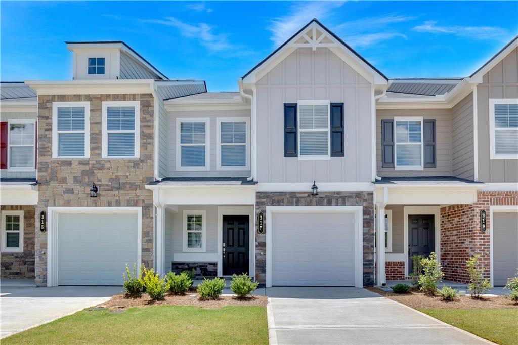 Move-in ready and full of charm, the Oleander at Village Green is a well-designed 3-bedroom, 2.5-bath new construction townhome. The open-concept main level features LVP flooring, a linear fireplace, and a stylish kitchen with painted cabinets, granite countertops, tile backsplash, and a spacious island with overhang—perfect for entertaining or everyday living. All kitchen appliances are included for added convenience.
Upstairs, the private primary suite offers a cozy sitting area and a spa-like bathroom with tile flooring, double vanities, and a walk-in closet.
Located in Adairsville with easy access to I-75, Village Green offers affordable, low-maintenance living with builder warranties and 100% USDA financing options available.
Ask about up to $12,000 in builder-paid incentives when using our preferred lender.