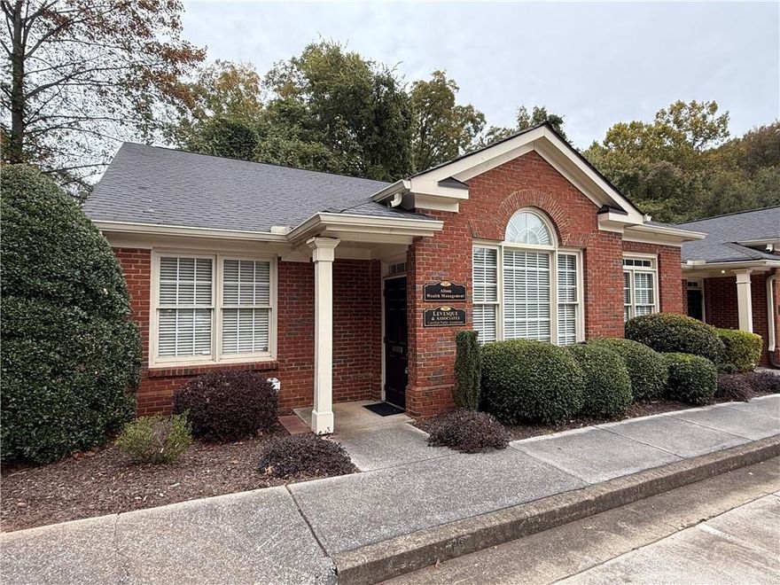 Professional office located off Historic Kennesaw Avenue near the Marietta Square. Minutes to Wellstar Hospital, and I-75. Reception area, conference room, 5 or 6 offices, two bathrooms, kitchenette area, filing/workroom room and storage closet. Elegant brick exterior with covered porch entry.  Owner pays the maintenance fees for the complex, all other utilties are paid by the tenant. Easy access to show.