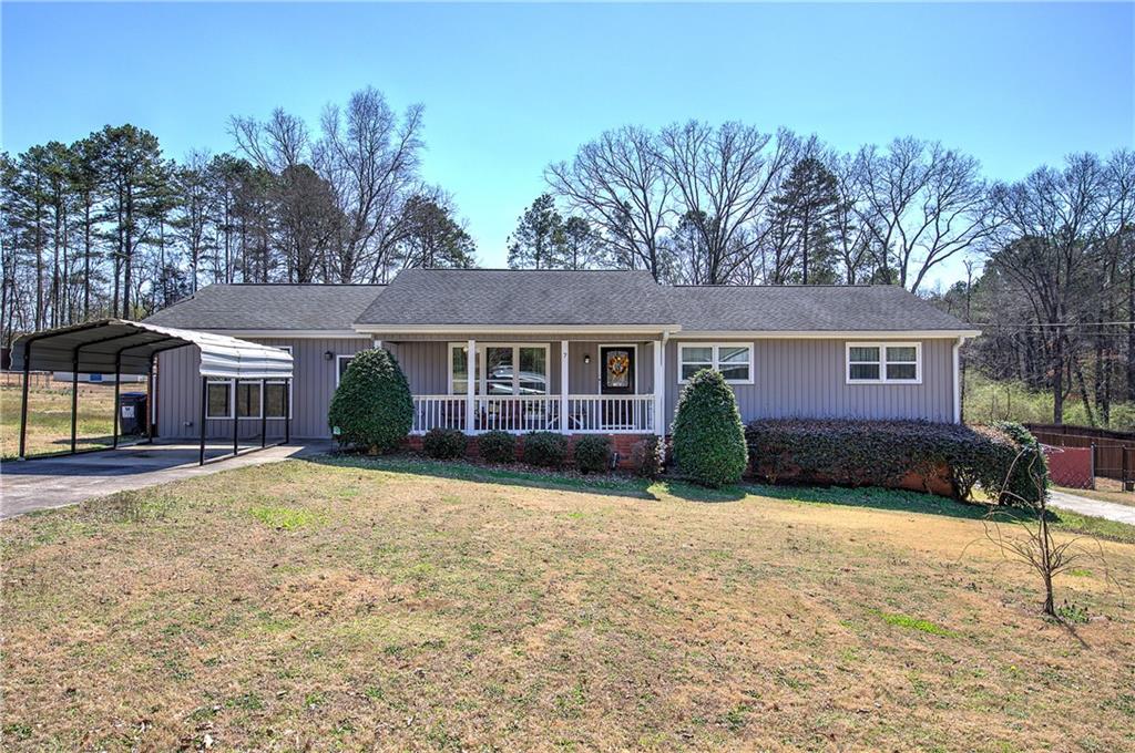 Welcome home! This home features an open concept! 3 bedrooms and 3 full bathrooms. Kitchen features Granite Countertops with lots of cabinet space, canister lighting and pantry with pullout shelves/drawers. This home has LVP flooring and also a rock/stone fireplace with gas logs. 196 sq ft enclosed sunroom with hot tub and tile floor. 18X36 in ground pool with fenced backyard- separated by a fence for privacy for the pool.