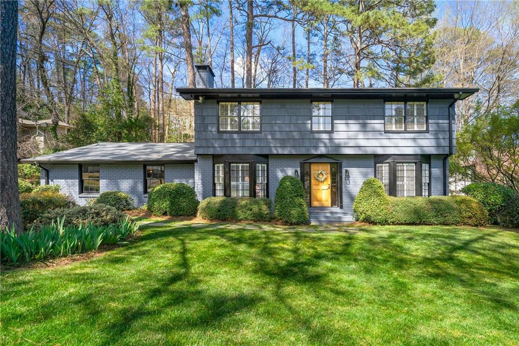 Awesome updated 4 bedroom, 2.5 bathroom home in great ITP neighborhood! Gorgeous new kitchen with white shaker cabinets, gold hardware, quartz countertops, farm sink & peninsula for seating. Eating nook has double sliding glass doors leading to the back patio oasis! Gleaming hardwoods throughout, fresh paint, updated lighting & electrical, newer driveway, brand new roof July 2023. Separate formal dining & living room with lots of natural light. Master suite has a large shower with lovely spa like tile, double vanity, walk in closet & beautiful views of the spring blooms in the backyard. This spacious home has been very well maintained over the years. Extra spot upstairs for an art/music/sewing room and a huge workshop/mudroom off the 2 car garage. Private back yard, sprinkler system in front yard. Beautiful lawn, masterpiece of springtime dazzling blooms! Great opportunity to get into a good school district at a reasonable price point! Walk or bike to optional Leslie Beach Club (swim and tennis). Fabulous location, close to everything-- minutes to major highways, Brookhaven, Chamblee, Decatur, Tucker, Toco Hills, Buckhead and more! Come take a look today!