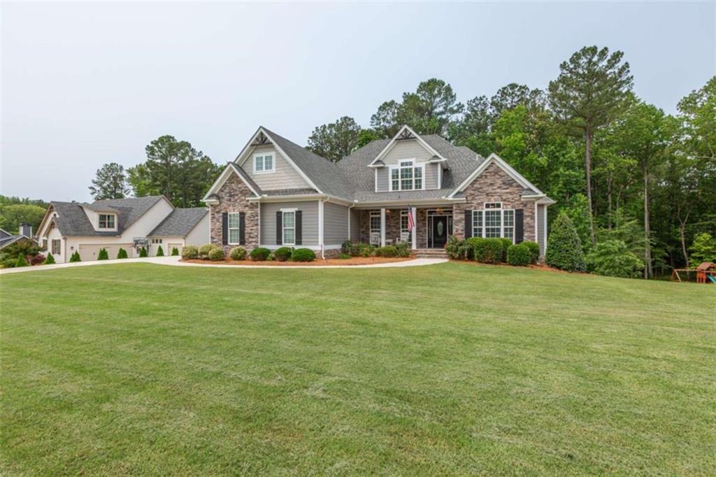 This home was built in 2017 and has 3034 finished sq ft with an additional 2245 sq ft of unfinished basement space, which includes a storm shelter! 4 bedrooms + a super large bonus room, and 3 full baths + a guest bathroom. The primary bedroom is on the main level along with 2 additional bedrooms, office, dining room, laundry room, drop-zone for coats & shoes, and a large open kitchen with eat-in area and breakfast bar! The kitchen has real-wood, custom cabinets, granite countertops, and workspace for everyone to help. The great room has a beautiful fireplace, tall, coffered ceilings, built-in bookshelves, and extra-tall, sliding glass doors to the enlarged back porch with another fireplace and extended ceilings. The primary bedroom has a massive on-suite with long vanity, storage tower, huge walk-in shower, private toilet, and expansive walk-in closet. The two additional bedrooms on the main level share a full bathroom with tile shower. Upstairs is a bonus room- over the 3-car garage- to give you an idea of just how big that room is! The 4th bedroom and a full bathroom, also with tile shower, are upstairs which could be a good space for privacy. The basement is yours to create your own personalized space, and is plumbed for a bathroom! New carpet, Roof is only 8 years old. The back deck will be re-stained or a credit given to the buyer at closing. Note- the septic is in the front yard so there is a room for a pool, if you desire! The front and back yard have sprinkler system. The Estates of Beaconsfield is an established neighborhood districted to Northgate HS, Madras Middle, and Canongate Elem. Beaconsfield offers a: pool, tennis/pickleball court, basketball court, playground, sidewalks & street lights, and also a vast array of activities for the home-owners and kids like food trucks, easter egg hunts, visit from Santa, "Pub Crawl," etc. It's super convenient to schools, I-85 (approx 20-25 min to Hartsfield Jackson International Airport), Peachtree City, Newnan, and Senoia. Washer & Dryer, and Refrigerator are negotiable to convey.