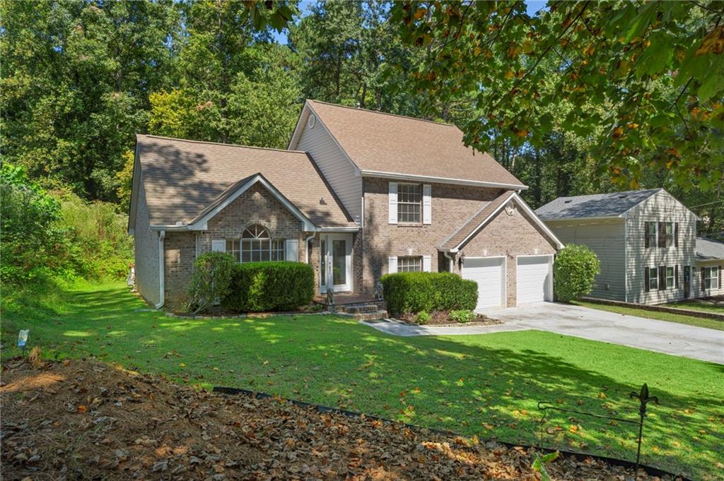 Photo of 2575 Ravencliff Road, Atlanta, GA 30349 (MLS # 7840893)