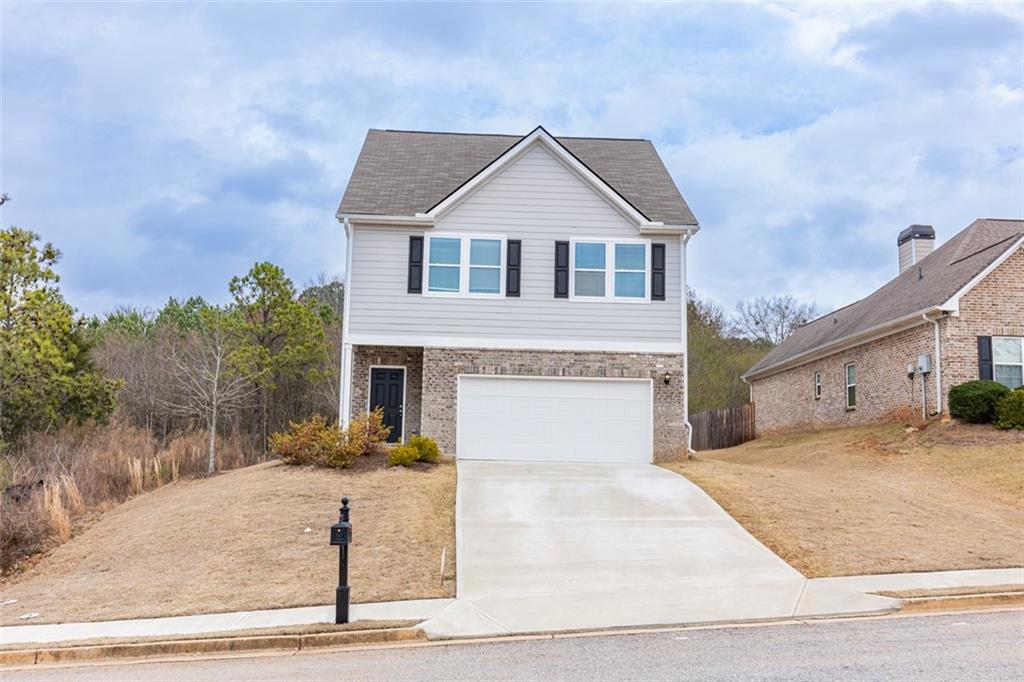 Spacious 4 bedroom/3.5 bath two- story home with private backyard. Practically brand new features open kitchen to family room w/ vaulted ceilings. Kitchen boasts plenty of cabinets with large island, stainless steel appliance package, granite countertops. Luxury LVP floors included in foyer, family room, kitchen and breakfast area. Master on main, master bath with separate tub & tile shower, granite countertops and tile flooring. All situated in a swim/tennis community!