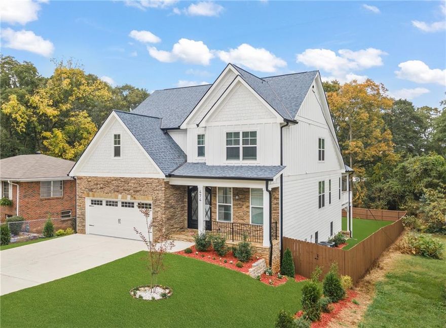Stunning New Construction Near Marietta Square! Discover luxury and convenience in this brand-new construction home located just moments from the vibrant Marietta Square! This 6-bedroom, 4.5-bath quality built home with designer touches is move-in ready and offers timeless elegance in a charming, transitioning neighborhood that combines character and modern amenities. Key Features: Main Level Comfortable Elegance, Custom Entry: Double wrought iron doors make a striking first impression. Gourmet Kitchen: Designed to inspire, featuring quartz countertops, a stylish backsplash, oversized island, walk-in pantry, and brand-new LG stainless steel appliances. Two-Story Great Room: Designer wood ceilings and oversized windows flood the space with natural light, creating an inviting and relaxing atmosphere. The indoor to outdoor living experience is bar none! Featuring A Covered Deck: Enjoy peaceful outdoor living with double ceiling fans, perfect for entertaining or unwinding. Overlooking the large spacious, fenced backyard. Primary Suite on Main: A luxurious retreat with a spa-inspired en-suite bathroom, including double vanities, a freestanding soaking tub, a separate shower, and custom walk-in closet shelving. Second Floor Sophistication, Open Loft Space: Overlooking the living room, ideal for a reading nook or additional lounge. Three Spacious Bedrooms: All with large, custom walk-in closets. Additional Storage: Convenient hallway storage for extra functionality. Fully Finished Terrace Level: In-Law Suite or Home Office: Includes a second full kitchen with new appliances, second laundry room, two spacious bedrooms, and a large entertainment space. Enhanced Comfort: Double-insulated walls for sound and temperature control. Additional Upgrades: Solid hardwood floors throughout with elegant 8" baseboards. 8-foot exterior doors for a grand architectural touch. Three HVAC units and a tankless water heater for energy efficiency. Irrigation system for easy lawn maintenance. Fully fenced backyard with endless possibilities – perfect for a future pool or gazebo. One-year home warranty included for peace of mind. Prime Location: Situated in the heart of a walkable community near Marietta Square, this home offers easy access to an array of local attractions: City Club of Marietta, Cobb County Civic Center, The Aquatic Center, Kennesaw Mountain, shopping, dining, and cinemas! Quick connections to I-75 and I-285. This remarkable home offers a rare opportunity to enjoy modern luxury, thoughtful design, and a thriving location. With NO HOA and unmatched convenience, this property is the perfect place to call home.