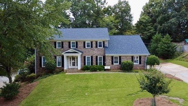 Welcome home to 5232 Wynterhall Drive! This beautifully renovated 4-bedroom, 3.5-bathroom residence perfectly blends modern elegance with everyday comfort in one of Dunwoody’s most desirable neighborhoods.
The heart of the home features a stunning renovated kitchen open to the family room with an upgraded stone fireplace, ideal for gatherings. The remodeled primary suite is a true retreat with a raised trey ceiling, an added window for abundant natural light, an expanded spa-like bathroom, and a spacious walk-in closet. Step outside to your private oasis designed for entertaining and relaxation. A covered porch and two decks overlook the walk-out backyard, enhanced by lush zoysia sod, a stone retaining wall, and beautiful Japanese maple trees.
This home has been freshly painted and thoughtfully maintained with big-ticket upgrades including a new roof (2025), hot water heater (2024), garage door (2023), and more — giving buyers peace of mind.
Unbeatable Location & Lifestyle: Situated just minutes from Dunwoody Village, Spruill Center for the Arts, and Dunwoody Nature Center, residents enjoy a vibrant community rich in culture, recreation, and dining. Grocery shopping, coffee shops, and popular local restaurants are less than a mile away. Families will love the top-notch schools, including award-winning Austin Elementary, as well as access to nearby swim/tennis clubs. For commuters, the property is ideally located near three access points to GA-400, keeping you connected without the stress of traffic.
Don’t miss the opportunity to make this stunning Dunwoody home yours. Schedule your private showing today and experience the perfect balance of luxury, convenience, and community living.