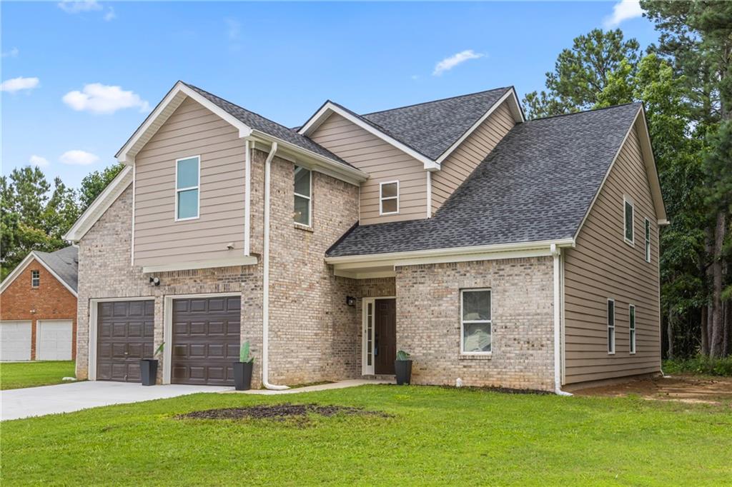 MOVE IN READY - Renovated Home in South Fulton
Welcome to a home where every inch has been thoughtfully upgraded with meticulous attention to detail. Located in a quiet, established family neighborhood in the heart of South Fulton, this stunning residence combines modern sophistication with everyday comfort—perfectly positioned just minutes from Mayors Park, Ronald Bridges Park, major interstates (I-85, I-75, I-285), and downtown Atlanta.
Have peace of mind when you step inside to discover a completely refreshed interior featuring BRAND NEW PAINT INSIDE AND OUT, ALL-NEW DESIGNER LIGHTING, and NEW WINDOW TREATMENT throughout. The heart of the home—an open and airy kitchen—boasts UPGRADED LG STAINLESS STEEL APPLIANCES, GRANITE countertops, and a striking NEW TILED BACKSPLASH and walls, all complimented by contemporary hardware and fixtures.
Both bathrooms have been tastefully modernized with NEW GRANITE VANITIES, PREMIUM FIXTURES, and stylish finishes that reflect quality craftsmanship. Outside, a BRAND NEW ARCHITECTURAL ROOF, NEWLY POURED DRIVEWAY, and professionally painted exterior provide worry-free curb appeal.
This move-in-ready gem is also just a short drive from Hartsfield-Jackson International Airport and convenient to local shopping and dining, offering the perfect blend of suburban tranquility and urban accessibility.
Don’t miss this rare opportunity to own a beautifully renovated home in one of South Fulton's most accessible and family-friendly communities.