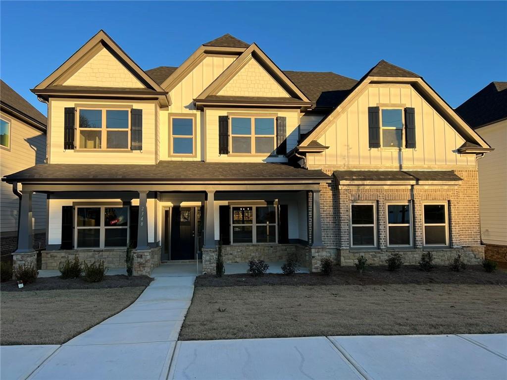 Stunning Craftsman-Style Home by Dove Lake in Downtown Grayson!
This beautiful home is nestled in the heart of downtown Grayson and built around the scenic Dove Lake, offering tranquil views and exceptional craftsmanship throughout.
Featuring double master suites, including a spacious master bedroom on the main level with a private seating area, large walk-in closet, and a luxurious en-suite bath with tile flooring, a separate soaking tub with tile surround, and a walk-in tiled shower with bench seating.
The open-concept kitchen flows seamlessly into the family room with an elegant electric fireplace. The kitchen boasts a 9.5-foot island with double sink and water line, stainless steel appliances, 42” cabinets, tile backsplash, and LVP wood-plank flooring throughout the kitchen, breakfast area, and foyer. A massive walk-in pantry offers ample storage space.
Upstairs, you'll find a second master suite with stunning lake views, along with spacious secondary bedrooms. All secondary bathrooms and the laundry room feature durable LVP flooring. A convenient half bath is located on the main floor for guests.
Enjoy outdoor living on the covered back patio complete with a cozy wood-burning fireplace and unobstructed views of the lake. The large lakeside green space is perfect for outdoor activities, providing a peaceful, natural environment ideal for summertime enjoyment. A scenic walking trail around the lake leads directly to a nearby shopping center.
Move-in ready—schedule your private tour today and experience lakeside living at its finest!