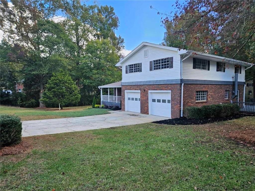 Downtown Alpharetta living awaits! HUGE fenced in yard and dogs allowed! Amazing location and easy walk to the rear staircase in the neighborhood that leads to downtown. Enjoy the Alpharetta Saturday Farmer’s Market, cafés, restaurants, night life, live musicians, concerts, library and the City Center. Relax on the rocking chair front porch or the rear deck. Huge yard on a corner lot, fully fenced in! You'll be the first to live in this fully renovated home, just completed in 2023. FOUR bedrooms with two family rooms on the main, separate dining room or home office, and convenient laundry space with barn door. Updates include new carpet and paint, recently renovated bathrooms, updated fixtures, lighting and new kitchen appliances. Relax and grill out this fall on your large deck with side access to the second family room with half bath. Spacious corner lot on nearly 3/4 of an acre, fenced-in for play, entertaining or carefree living with pets. Note: Landscaping is in progress so even better yard and outdoor living space awaits. Call Sara for an easy showing tour and upgrade your lifestyle in 2023-24!
