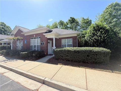 Photo of 11535 Park Woods Circle #E, Alpharetta, GA 30005 (MLS # 7753476)