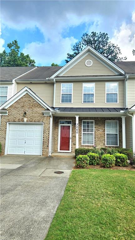 Welcome home to Kentmere! This spacious townhome has so much to offer. Pull into the driveway and step onto the welcoming covered front porch—perfect for morning coffee or an afternoon chat with the neighbors. As you enter through the front door, you will find a spacious dining room, eat in kitchen area and open views to the living room. The back patio is the perfect place to relax and unwind with a peaceful wooded view. Make your way upstairs to the primary suite with soaring ceilings and a spa like bathroom complete with soaking tub and a fabulous walk in closet. Two secondary bedrooms are generously sized with excellent closet space. The washer and dryer is included with the unit too. Location is everything with easy access to shopping, 400, the greenway, parks and zoned for the highly rated Forsyth County schools.