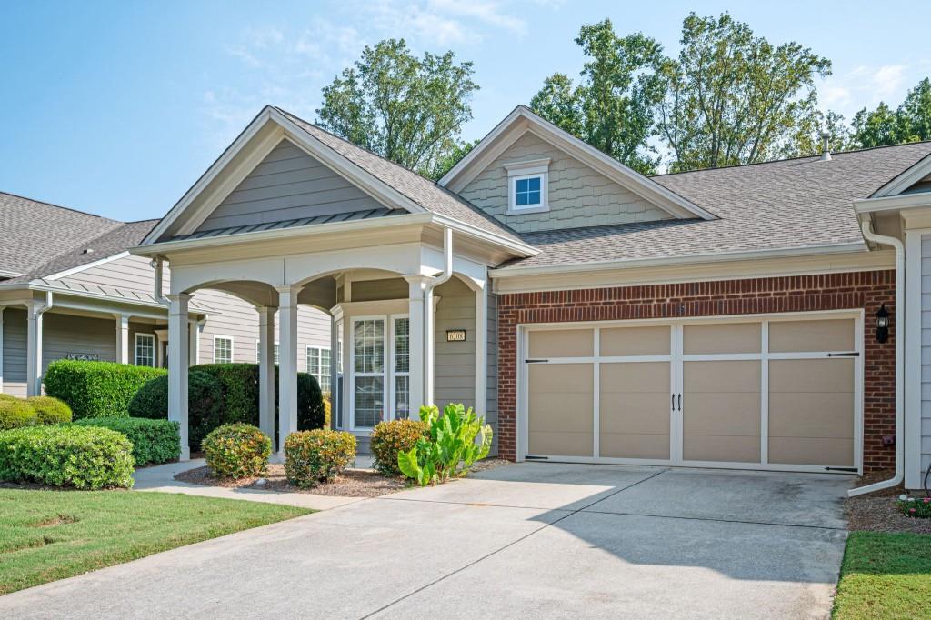 Welcome to 6208 Longleaf Drive in the highly desirable Village at Deaton Creek, an active 55+ community offering resort-style amenities and a neighborly lifestyle. This Kenwood floor plan villa features 2 bedrooms, 2 full baths, an eat-in kitchen, and a spacious living room that opens to a private patio and large, grassy backyard. The home has been beautifully updated with wood floors throughout, fresh paint in key rooms, a new ceiling fan, custom sunshade at the entry, and new curtain rods and curtains. Additional improvements include a replumbed main water line with pressure gauge, upgraded garage door motor, spring, and rollers, Nest programmable thermostat, HVAC with UV and HEPA filters serviced twice yearly, new range/oven with built-in air fryer, and freshly painted kitchen and backsplash. The lanai, hallways, master bedroom, and bath have also been repainted. A Lavender Pest Control contract provides semi-annual interior, exterior, and attic treatments. Outside, the patio has been pressure washed, downspout filters added, outdoor spigots fitted with temperature-control covers, and ATT fiber wiring installed for high-speed internet. The HOA covers roof, exterior paint, gutters, and lawn care, making this the perfect low-maintenance lifestyle. Village at Deaton Creek offers an abundance of amenities, including indoor and outdoor pools, a fitness center, dance and exercise classes, clubs, and over 8 miles of walking trails. Added Peace of Mind: Seller has already paid in full the community-wide neighborhood improvements assessment.