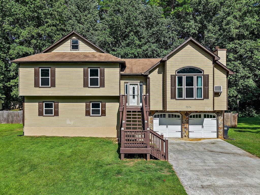Welcome home to 2504 Lorne Ct SW, Marietta, GA! This spacious and inviting split-level home features 4 bedrooms, 3 full bathrooms, and sits on a beautiful .3531-acre cul-de-sac lot. The private, flat backyard offers ample outdoor space, complete with a storage shed and a covered area ideal for boat storage or outdoor hobbies.
As you step inside, you'll immediately appreciate the expansive open-concept layout, where the generously-sized family room flows effortlessly into the kitchen and dining areas—perfect for gatherings and entertaining. The upper level boasts three bedrooms, including a delightful master suite with an extraordinary custom-designed master bathroom featuring stairs leading to a charming "princess closet" attic space, offering abundant storage and style.
The home's lower level includes a versatile, extra-large bonus room ideal for a home gym, playroom, or entertainment space, along with a private fourth bedroom and full bathroom—perfect for guests or extended family.
Additional features include a convenient two-car garage and a prime cul-de-sac location that enhances both privacy and community charm. Don't miss your chance to own this unique and welcoming home in sought-after Marietta in the Hillgrove school district.