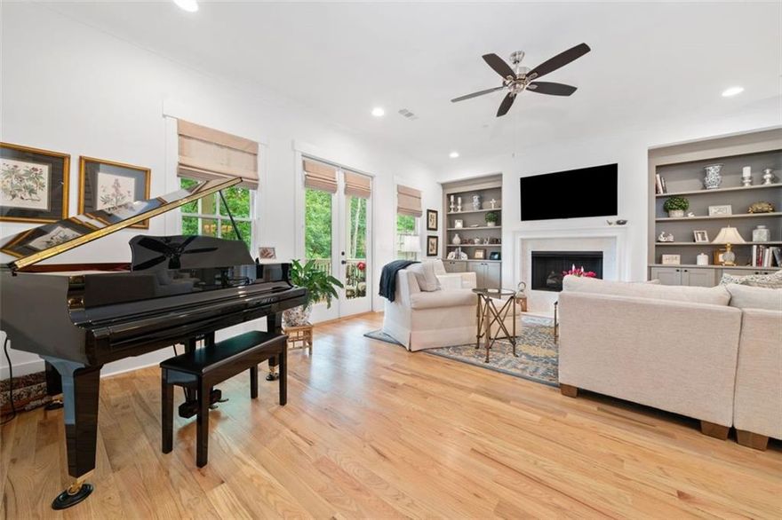 Location is key for this new expression of luxury! This property is nestled in a private cul-de-sac. The exterior has a beautiful brick finish. It has its own extremely private sanctuary in the back that is a complete surprise with two complete living spaces - a patio and deck. This first-class townhome is more than move-in ready. It has a beautifully appointed kitchen that any chef would love. The kitchen is adorned with sleek neutral quartz countertops and stainless appliances. There is a custom pantry plus a custom utility closet for appliances. There are 10-foot ceilings and 8-foot solid doors on the main level. There is a lovely great room/living room with a cozy fireplace that adds warmth and ambiance – whether you are entertaining or just relaxing. There are genuine hardwood floors throughout the entire home with runners added on the stairways. The windows are adorned with custom plantation shutters and custom valances. The primary suite is very spacious and has an ensuite bath enhanced with an over-the-top customized closet space for the owners. There is a versatile office/den or fourth bedroom downstairs. The two-car garage has epoxy flooring with space for utility storage. The HOA takes care of all the landscaping, leaving your weekends free to explore Marietta. This home is convenient to Kennesaw Mountain, Marietta Square, grocery shopping, and dining.
