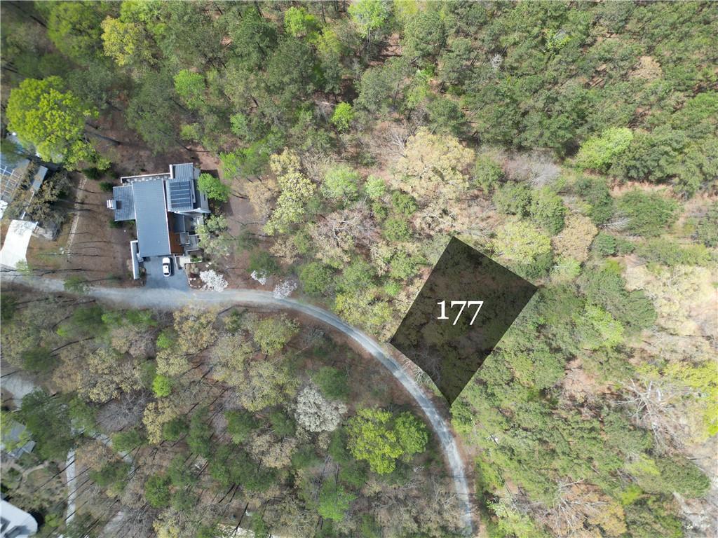 Nestled along the picturesque Rausch Ridge, this exclusive 0.16-acre estate lot offers a rare opportunity to build a custom home in the heart of Serenbeās sought-after Grange Hamlet. Perched above the treetops, your future home will enjoy breathtaking views of the lush forest canopy, creating a private, peaceful retreat just steps from everything Serenbe has to offer.
?
With immediate access to over 20 miles of soft-surfaced nature trails, you can walk, run, or bike through preserved woodlands right outside your door. Plus, as a resident of Serenbe, youāll enjoy the full spectrum of wellness amenities, including organic farm-to-table dining, a vibrant arts and culture scene, spa services, boutique shopping, fitness classes, and more.
?
This is your chance to create a one-of-a-kind sanctuary that blends luxury living with nature and community.