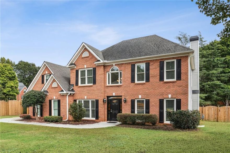 This is the opportunity you’ve been waiting for! Nestled in the heart of West Cobb, this beautiful home in the desirable Alexander Farms neighborhood offers space, style, and comfort.  Step inside to a light-filled two-story foyer flanked by a spacious dining room and a versatile living room—perfect as an office or playroom. The recently renovated designer kitchen features gorgeous cabinetry with frosted glass accents, a stunning stone backsplash, sleek countertops, and stainless-steel appliances. Open to the fireside family room, this space is ideal for both everyday living and entertaining.  A newly renovated full bath and a main-level bedroom (or office) add flexibility, while the oversized deck provides plenty of space to gather outdoors and enjoy Georgia’s beautiful seasons.  Upstairs, retreat to your oversized primary suite with a spa-like bath boasting a jacuzzi tub and double vanity. Three additional generously sized bedrooms include a flexible bonus room, perfect for a gym, playroom, or craft space.  All this, just minutes from top-rated schools—Cheatham Hill Elementary, Lovinggood Middle, and Hillgrove High—as well as The Avenue West Cobb, Marietta Square, Kennesaw Mountain, and vibrant local shops, parks, and restaurants.  Whether you’re hosting friends on the deck, working from home, or enjoying a quiet morning coffee, this home truly feels like a retreat without leaving home.