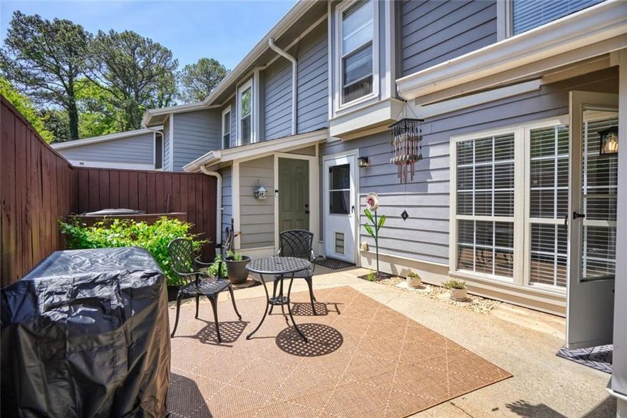 Seller to contribute $3,000 to Buyer if under contract by June 20, 2025! Welcome home to your spacious 2 bedroom, 2.5 bathroom East Cobb condo with not one, but two outdoor living spaces, in top-rated Cobb County (Walton High School) school district! When walking up to the home, you are greeted by a large outdoor patio with room to garden and gather. The main level consists of the kitchen with freshly painted cabinets, separate space for dining and ample living space to unwind at the end of the day. The half bathroom and laundry are conveniently located on the main floor. The upstairs has two large bedrooms, each with full bathrooms attached, the perfect roommate floorplan. This condo has been thoughtfully updated with fresh paint, updated lighting fixtures, and new bathroom vanities. The community has a beautiful pool to enjoy in the summertime as well as tennis and pickleball courts to be enjoyed year-round. An added bonus for pet lovers, this community is extremely pet-friendly as is the home itself with ample outdoor spaces for your animals to enjoy. This home is districted for Walton High School, regularly ranked in the top ten (currently #6)  best high schools in the state of Georgia. In addition to the fantastic schools, the location of this East Cobb home can't be beat given its plethora of parks, stores, restaurants and all that Marietta has to offer, including Marietta Square, just minutes away. Easily access Interstate 75 to zip to different parts of the city. Book your private tour today!