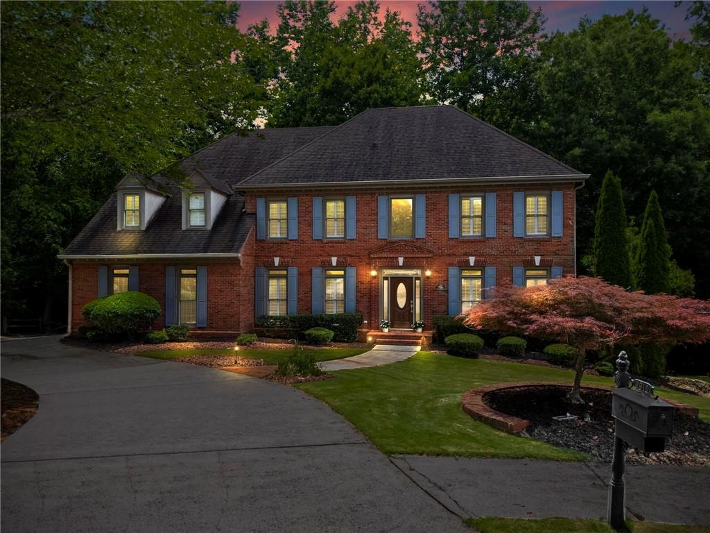 If you love the outdoors, this is the home for you! Situated on a serene half-acre wooded lot with a babbling creek, this stunning 4-sided brick traditional offers three expansive levels of completely private outdoor living—you’ll feel like you’re tucked away in the mountains, right in the coveted Chartwell neighborhood.
Situated on one of the most private cul-de-sac lots, the home boasts a 3-car side-entry garage, a spacious family room with a 2-story stacked stone fireplace, a beautifully renovated kitchen with a large island, stainless steel appliances, generous breakfast area, and access to the covered back porch, as well as a cozy keeping room with gas log fireplace.
The main level also includes a formal dining room and a flexible living room/study with a closet and full bath access—ideal for a guest room or home office.
Upstairs, the enormous primary suite impresses with a tray ceiling, spa-like ensuite featuring dual vanities, whirlpool tub, large shower, and a bonus sitting room/nursery/office, plus private access to the top-floor covered porch. The upper level also offers a versatile loft area and three additional spacious bedrooms—one with a private ensuite, the other two sharing a Jack-and-Jill bath.
The full daylight basement includes a third fireplace and opens to a beautiful brick patio, offering endless potential for customization.
Community & Location:
Chartwell residents enjoy top-notch amenities including a Clubhouse, Pool, Tennis Courts, Pickleball, Lake, and Playground, with path access to Newtown Park, which features over 2 miles of trails, the Veterans Memorial Walk, Park Place Senior Center, Burkhalter Amphitheater, and a 1-acre dog park with turf, sprinklers, and obstacle courses. Newtown Recreation offers a variety of youth sports including soccer, lacrosse, baseball, and adaptive recreation.
This unbeatable location is convenient to top public & private schools, GA-400, Historic Roswell, Avalon, and the Chattahoochee River, with direct access to shopping and dining.