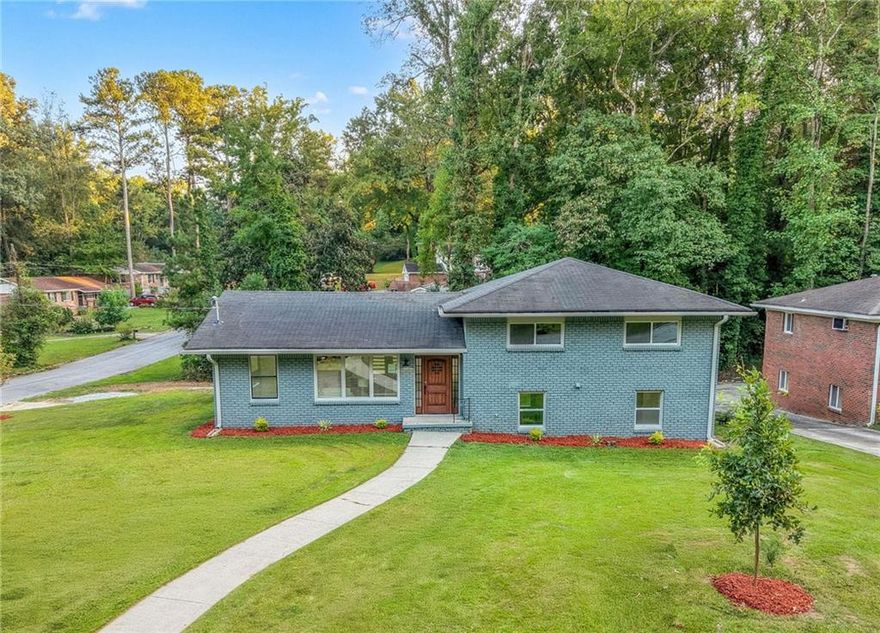 Welcome home to 3462 Ingledale Dr SW, a beautifully renovated and move-in-ready home in the heart of Southwest Atlanta! Perfect for first-time buyers who want modern style, peace of mind, and a great location, this 4-bedroom, 3-bath property offers 2,288 sq ft of spacious comfort and brand-new finishes throughout. Step inside and discover a bright, open floor plan featuring all-new electrical, plumbing, HVAC, kitchen cabinets, countertops, bathrooms, doors, flooring, and a large outdoor deck, everything done with permits! The main level blends living, dining, and kitchen areas seamlessly, ideal for entertaining friends or relaxing with family. The owner’s suite is a private retreat with a fully renovated bathroom and plenty of natural light. Three additional bedrooms provide flexibility for guests, kids, or a home office. The new deck is perfect for BBQs and weekend gatherings. Located in the peaceful Heritage Valley community, you’ll love being close to Greenbriar Mall, Camp Creek Marketplace, grocery stores, dining options, and Hartsfield-Jackson Atlanta International Airport, all less than 15 minutes away. Easy access to I-285 and I-20 makes commuting around Atlanta simple and convenient. With every system replaced and all renovations completed under permit, this home offers the reliability and comfort every first-time buyer deserves. Nothing left to do but move in and start creating memories!