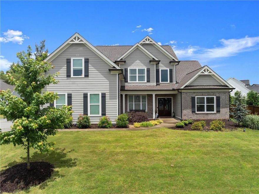 Welcome to this beautifully maintained home featuring a huge master suite on the main level, complete with space for a cozy sitting area or private home office. With 4 bedrooms and 3.5 bathrooms, there's plenty of room for family and guests. The  GIANT island in the kitchen is a chef's dream and compliments the farmhouse sink perfectly. 

Enjoy the outdoors in your large fenced backyard, perfect for entertaining- with a coverd patio, large deck, firepit, and a storage shed for all your extras. Inside, you'll find two fireplaces that create a warm and inviting atmosphere throughout the home.

Located in a vibrant swim and tennis community with a pool, water slide, and tennis courts, this property offers the ideal blend of comfort, functionality, and neighborhood amenities. Zoned for the highly desirable East Forsyth High School, this home won't last long!