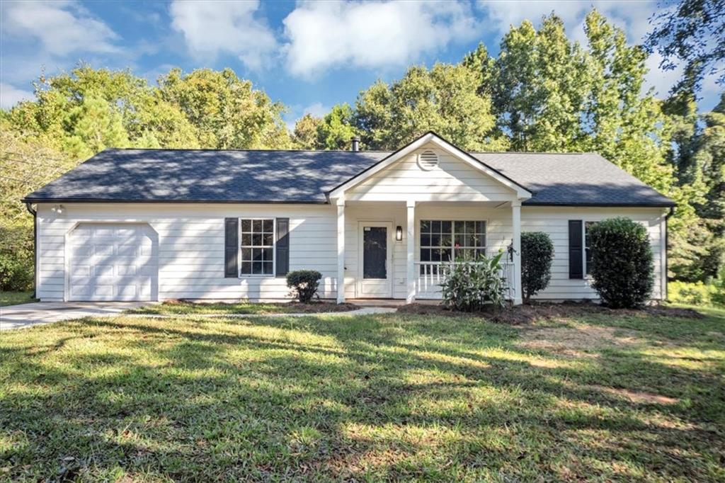 Welcome to your new renovated 3 bedroom two full bathroom home. Featuring exciting upgrades such as: brand new roof, brand new LVP floors, stainless steel appliances, granite counters, remodeled bathrooms with vanities, mirrors and tub/shower combo. Cozy up to the fireplace in your living room that also brings in a ton of natural light with bay windows. Don't forget to invite family and friends to your bbq and enjoy your .9 acre flat lot. Having no HOA means you can build the workshop of your dreams and still have plenty of space for your kids and pets to play. The septic and well have also been inspected/maintenance and ready for you to have the peace of mind that you're home is ready for you! Copies of all of the work will be provided once under contract.