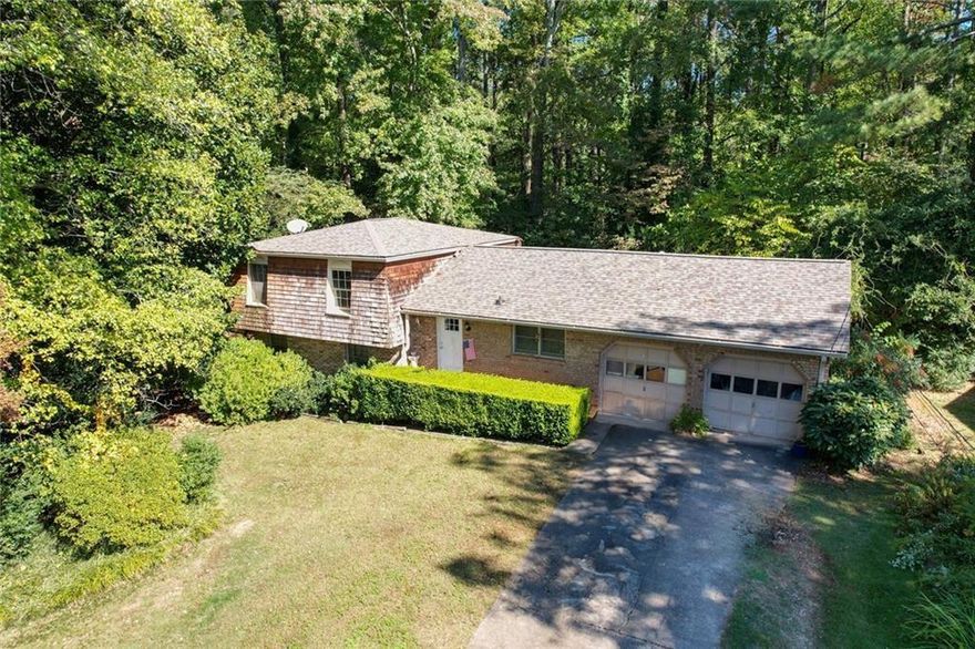 CALLING ALL BUILDERS, INVESTORS, OR SOMEONE LOOKING TO BUILD THEIR DREAM HOME! 
This is your chance to build in one of the most desirable and rapidly appreciating neighborhoods just outside Downtown Alpharetta. Nestled in the heart of Alpha Park, a nearly ½ acre basement lot offers endless possibilities for a stunning new build.

Live just minutes from everything Alpharetta has to offer! Enjoy a 3-minute walk to The Maxwell — home to Rena’s Italian Fishery & Grill, Lily Sushi Bar, Fairway Social, and more. Or around the corner to explore the award-winning shops, restaurants, and entertainment of Downtown Alpharetta.

Surrounded by new construction homes valued at $2M+, this property is not only a place to live — it’s a smart investment. Enjoy the privacy of a residential lot while being right off the AlphaLoop, perfect for walking, biking, and connecting to the vibrant community.

With easy access to GA400, top-rated schools, and a dynamic mix of local amenities, this location is the total package.

Bring your builder and your vision — this is the opportunity you've been waiting for! Home sold as-is.