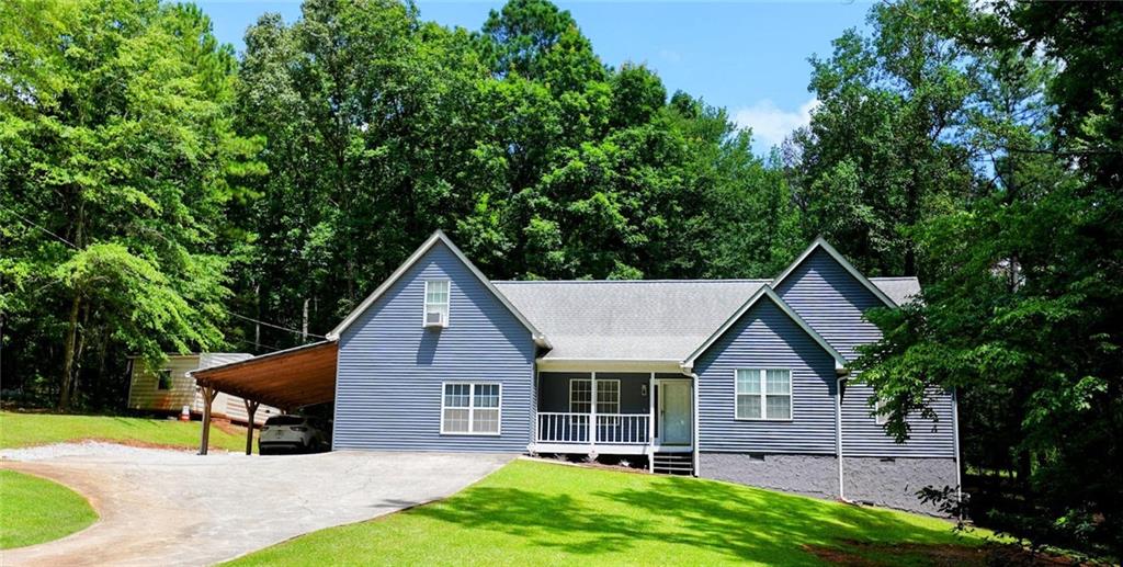 Secluded Retreat with Modern Comfort - This beautifully updated 4-bedroom, 3-bathroom home offers the perfect blend of peaceful seclusion and everyday convenience. Located in a highly desirable area of Winston, this home provides easy access to local amenities, top-rated schools, and major highways-while still giving you the tranquility of country living. This home features a gourmet kitchen with stainless steel appliances, rich wood cabinetry, sleek backsplash, and an oversized island-perfect for cooking and entertaining. Luxurious bathrooms, including a spa-like primary ensuite with dual vanities, a glass-enclosed walk-in shower, and built-in shelving for sleek storage. Bright, flexible spaces like the open office/studio with soaring ceilings and updated flooring-ideal for remote work, hobbies, or creative pursuits. Spacious and well-appointed bedrooms offer room for family, guests, or a home gym. Peaceful, wooded surroundings with plenty of room for gardening, playing, or relaxing in nature. Quiet and secluded, yet just minutes from shops, restaurants, schools, and commuter routes. Don't miss your opportunity to own this rare gem that truly offers the best of both worlds-privacy and proximity.