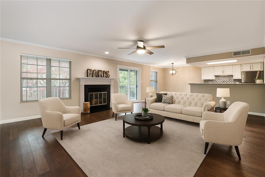Avalon & downtown Alpharetta is 5 minutes away & only 3 minutes from GA400. This remodeled 2BR/2BA condo is perfect with quality upgrades: newly installed padded wide plank engineered hardwood flooring, remodeled kitchen/appliances/counters, new outlets/switches/knobs/hinges, new fans/recessed/lighting throughout, custom paint with smooth ceilings, and so much more. Floorplan offers large family room flanked by warm fireplace, open kitchen with bar stool top, two separate large bedrooms/baths, lots & lots of closet space, storage and large balcony spanning width of living room. Neighborhood offers swim/tennis and rent includes water & trash service. Ample parking, this quiet community is conveniently located and a hidden gem in Alpharetta, LOCATION/LOCATION/LOCATION. Owner is the listing agent.
