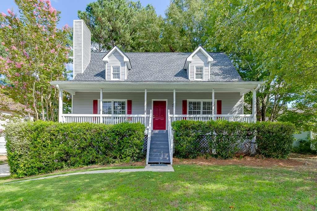 Charming 3BR/2.5BA in the Heart of Sugar Hill! Nestled in the sought-after Lanier School District, this cozy home welcomes you with inviting living spaces and a layout perfect for both relaxing and entertaining. The spacious primary suite is conveniently located on the main level with its own private bath, along with a half bath for guests. Upstairs, you'll find two large additional bedrooms and a full bathroom-perfect for family or visitors. The home features stainless steel appliances, a new roof in 2024, updated plumbing, hot water heater replaced in 2023, new vinyl siding in 2025, luxury vinyl flooring throughout the main floor, and a large rocking chair porch that spans the front of the house. Conveniently located near GA 400, Peachtree Industrial Blvd, 985, I-85, and the Mall of Georgia, you'll love the ease of access to shopping, dining, and commuting. Step outside to your private back deck (new in 2025)-ideal for grilling out on crisp fall afternoons while cheering on your favorite team. When it's time to head out, enjoy being just minutes from Sugar Hill's vibrant dining options, coffee shops, and local favorites.
