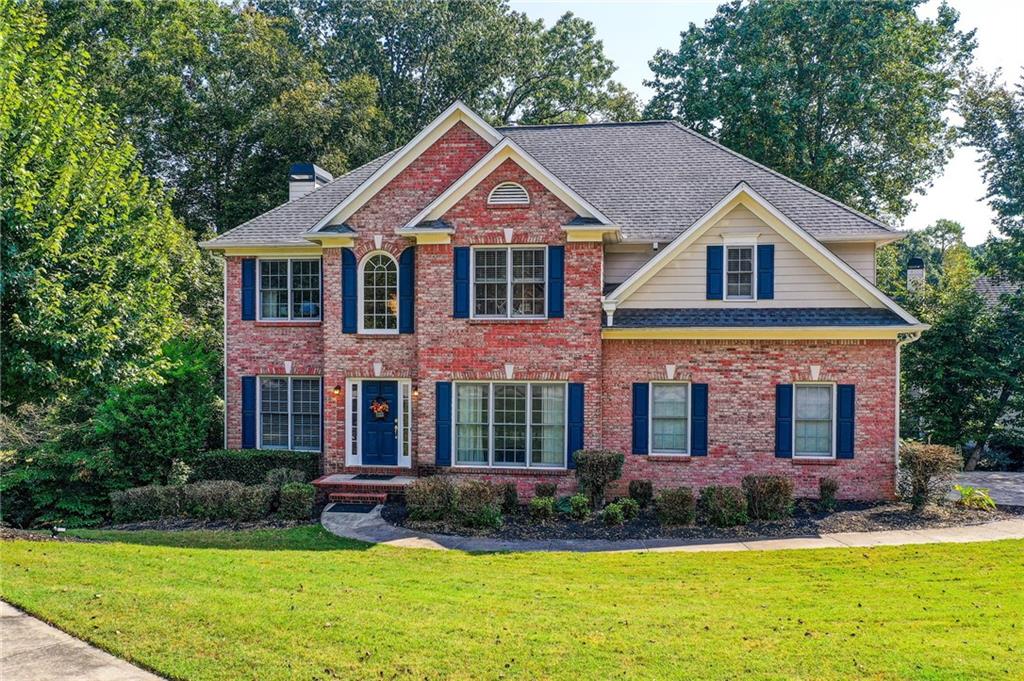 Welcome to this spacious 6-bedroom, 4-bath home in the sought-after Hamilton Mill community. With nearly 4,800 square feet of living space, including a fully finished basement, this property offers room to spread out while enjoying thoughtful design and modern finishes.
The main level features an inviting living room with a cozy fireplace, flowing seamlessly into the gourmet kitchen. Granite counters, stainless steel appliances, a gas range, and double ovens make cooking a delight, while the large back deck is perfect for dining outdoors and enjoying the wooded view with a creek towards the back of the property.
Upstairs, the primary suite provides a true retreat with a soaking tub, separate shower, and generous closet space. Additional bedrooms are equally comfortable, giving everyone plenty of room. The fully finished basement adds even more living space with a full bedroom, full bath, and flexible areas ideal for a media room, playroom, or guest suite.
Set on a wooded lot, this home combines privacy with access to Hamilton Mill amenities. Community pools, tennis, golf, and nearby shopping and schools make this an ideal choice for those seeking both comfort and convenience.