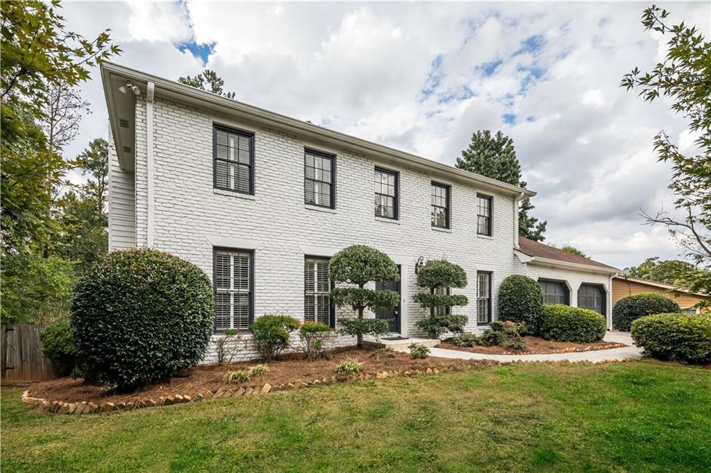 Picture perfect 4 bedroom home in East Cobb. This fully updated 4-bedroom, 4-bath residence boasts beautiful hardwood floors and abundant natural light. Enjoy a spacious open-concept living area, a modern eat-in kitchen with all stainless steel appliances, generously sized bedrooms and fully updated bathrooms. The finished basement offers versatile space for a family room or home gym with a full bath. Step outside to a private, fenced-in backyard, perfect for entertaining. Don’t miss out on this ideal blend of comfort and style!