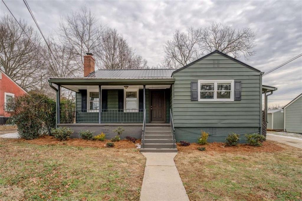 Updated cottage-style gem in the heart of Covington, GA! This charming 2-bedroom, 1-bathroom home has been thoughtfully renovated to offer a cozy and modern living space. Step inside to find sleek new LVP flooring, fresh interior and exterior paint, and a durable new metal roof that adds both style and longevity. The kitchen features brand-new appliances and stunning quartz countertops, which are also showcased in the upgraded bathroom-adding a touch of elegance throughout. Nestled in Covington's approved golf cart zone, you're just minutes from the vibrant downtown scene filled with shops, restaurants, and local attractions. With easy access to I-20, commuting is simple and stress-free. Whether you're a first-time buyer, downsizing, or looking for a charming retreat, this delightful home offers the perfect blend of comfort, convenience, and character. Don't miss out-schedule your showing today!