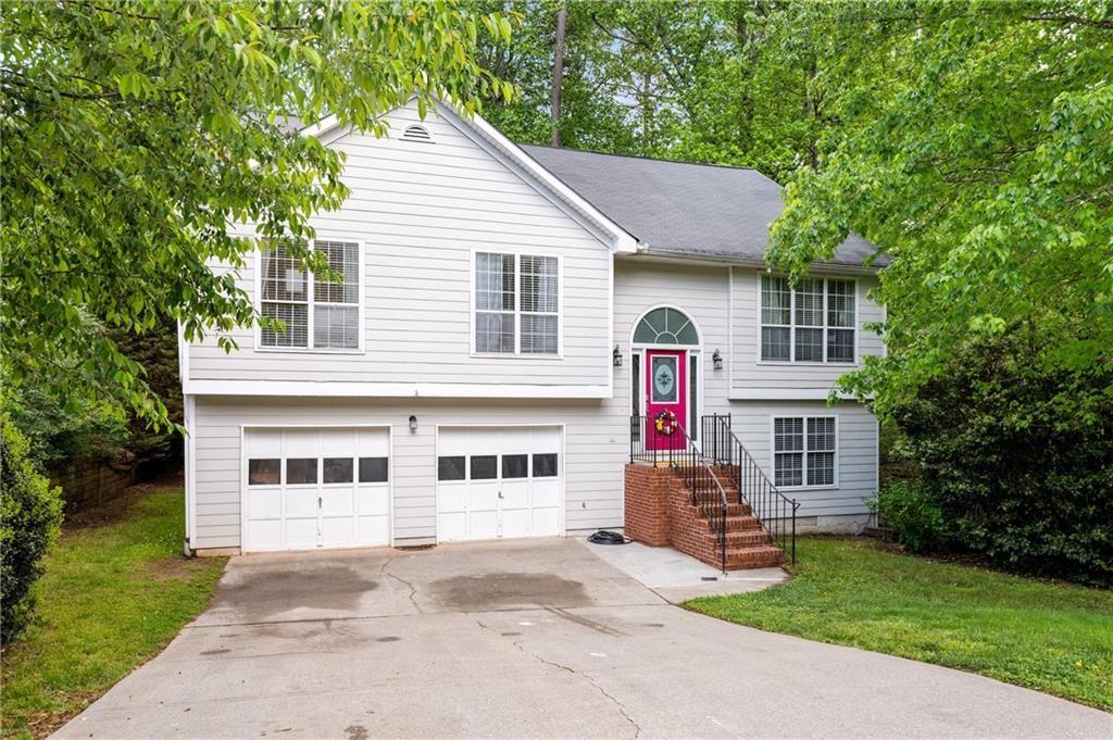 Absolutely charming, well maintained home located in sought after Duluth. Great location, easy access to shopping, restaurants, local parks and highways. Spacious 4 bed 3 bath home with a large living room. Hardwood floors in main living area. Breakfast area off the main kitchen, separate formal dining room. Gourmet white kitchen cabinetry with updated backsplash and granite counter tops. Master on Main with 2 additional secondary bedrooms. 4th bedroom in the lower level with oversized bonus room. 2-Car Garage with ample storage. Large backyard is great for outdoor entertaining. Additional concrete patio underneath the large back deck for additional outdoor enjoyment. Easy access to the 43" foot back deck from your master bedroom as well! Enjoy the freedom of no HOA and the prime location with easy access to Downtown Duluth, I-85, TPC Sugarloaf, and an array of shopping and dining options. Don’t miss the opportunity to make this exquisite home yours!