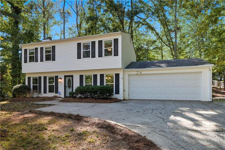 Welcome to this beautifully renovated 3-bedroom, 2.5-bath home, ideally situated on a private cul-de-sac lot in the tranquil Rock Mill neighborhood. This home offers a perfect blend of timeless character and modern comforts.

Step into the main level featuring engineered wood flooring flowing through the formal dining room and family room which is anchored by a brick fireplace. The spacious sunroom offers incredible versatility—perfect as a second den, playroom, home office, or anything else your heart desires. Upstairs, the generous primary suite includes an updated bath with modern finishes, while the secondary bedrooms are roomy and inviting. The updated kitchen features granite countertops, stainless steel appliances, and plenty of storage—ready for your favorite meals and gatherings.

Outside, enjoy private surroundings and a quiet lot in a top-rated Cobb County school district. This home is truly move-in ready and offers the perfect mix of style, comfort, and location.