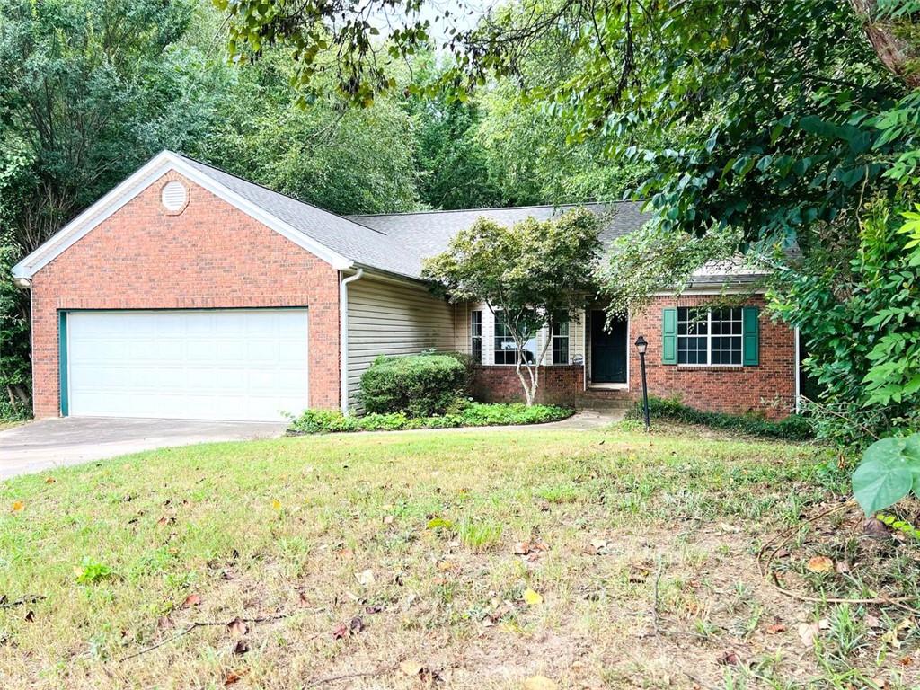 Great investor opportunity or owner-occupant looking for a lot of sweat equity. Split bedroom ranch floorplan on full basement sits on a private and wooded 2.2-acre lot that backs to an 18-acre wooded property. NEW ROOF just installed, brick front, and vinyl siding exterior. Large Den with gas fireplace opens to the deck overlooking the fenced and private backyard. Private owners suite with double vanities, garden tub, separate shower, and walk-in closet. Full finished daylight basement with bedroom, full bathroom, and large open room that
is perfect for your Game Room, Media Room, or bar. Quiet neighborhood of nice homes on large lots that is less than 3-miles to Interstate 20 and Sweetwater Creek State Park and very convenient lots of shopping and dining choices, golf, hiking and biking trails, and the NEW Greystone Amphitheatre in downtown Douglasville with concerts, farmers market, and lots of other cultural and entertainment activities. Come see for yourself!!
