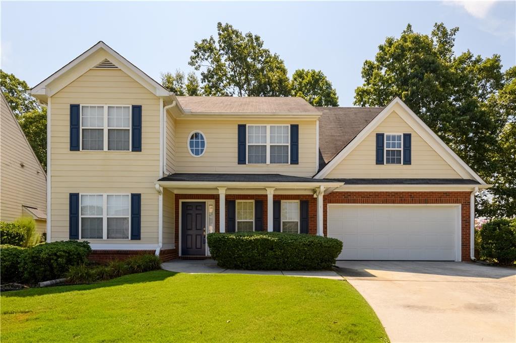 Nestled in a desirable subdivision in Gwinnett County, this stunning 4-bedroom, 2.5-bathroom partial brick and frame home is a true gem with recent updates through out this house. From the moment you step into the inviting foyer, you'll feel right at home. The thoughtfully designed floor plan includes a spacious formal living and dining areas with separate family room and an array of desirable features such as soaring 9 ft ceilings on the main floor, Cathedral Ceilings, Low Flow Plumbing Fixtures and Updated LVP flooring. New carpet in all bedrooms. The family room boasts a cozy fireplace 2 story ceiling, while the formal dining room and eat-in kitchen offer ample space for entertaining. The kitchen is a chef's delight with a breakfast bar. The expansive master suite includes a relaxing sitting area and a large walk-in closet. The luxurious ensuite bath features a marble vanity, LVP flooring a separate jetted tub, and a walk-in shower. All secondary bedrooms and bonus living spaces are thoughtfully placed within the home for privacy and convenience. This home provides the perfect setting for private gatherings. Located in a quiet neighborhood within an excellent school district, this property offers both comfort and convenience for your family's lifestyle.