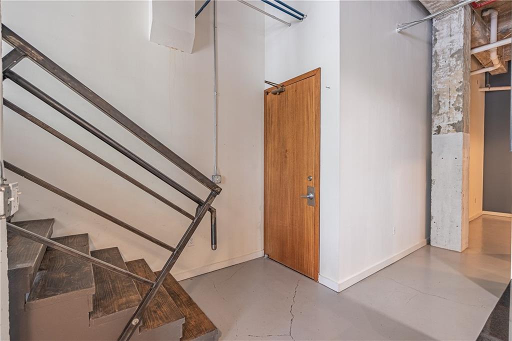 Authentic loft living in the historic Troy Peerless community. Legal rent of $2232 includes mandatory monthly administrative fee for tenant services (Move In Fee). Ponce City Market and beltline access across the street. 1 bedroom 1 bath w/ additional loft/guest room/office with lower storage or flex space. 15 foot ceilings, open floorplan, rustic exposed brick, granite counters, stainless steel appliances, washer/dryer included. Features include a roof top and side patios for entertaining guests, two designated parking spots, gated access, gym and lounge. Walkable to the Beltway, green space, and dining. You will find it all right here! :HOA move in fee of $25.
Minimum Requirements to Lease;
- must earn no less than 3 times the monthly rent.
- must have a minimum 625 credit score
- no evictions or outstanding landlord debt in the last 7 years
- no felony criminal history in the last 7 years
- no open bankruptcy's.
Pets are welcome, however we have specific breed restrictions, and specific weight restrictions. We do not allow any full/mixed aggressive breeds and we have a maximum weight allowance of 60 lbs. There is a non-refundable pet fee of $300 the first year. Each additional year you lease with us an additional $150 non-refundable pet fee would be due.