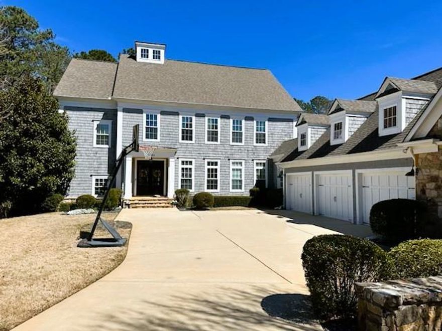 Enjoy the best that East Cobb has to offer! Breathtaking 6 bed / 6.5 bath home nestled in an exclusive 5-home community in Top Ranked POPE HIGH SCHOOL district. This residence offers a true outdoor oasis with a heated saltwater POOL, spa, and breathtaking LAKE VIEWS. Entertain around the FIRE PIT, relax on the lower patio, or enjoy the SCREENED-IN PORCH. Step inside to an immaculate home that showcases thoughtful attention to detail at every turn. The Family room features coffered ceilings, custom built-ins with shiplap accents, and a gas log fireplace. The gourmet kitchen opens to the Family Room and is equipped with brand NEW, top of the line JENN-AIR PROFESSIONAL STYLE APPLIANCES, including a 48 inch, 6-burner gas range with griddle and double ovens, a Built-in Luxury 48-inch Jenn Air Refrigerator, plus matching drawer microwave and dishwasher. The EXPANSIVE CENTER ISLAND and features quartz countertops with new designer pendant lighting. The breakfast area can hold a banquet sized dining table and offers serene lake views. Additional features include a pantry with built-in wood shelving, a tiled MUDROOM with storage cubbies plus two built in "homework" desks and a butler’s pantry with quartz countertops and shiplap accent wall. The Main Level features a private Guest Suite with Full Bath which could also be used as a Home Office. Retreat to the PRIMARY SUITE ON THE SECOND LEVEL that boasts a spa-like bathroom with his and hers vanities, a soaking tub, and an oversized seamless glass shower. The walk-in closet with custom shelving system is super spacious and has a separate entry to the Laundry Room. ALL BEDROOMS FEATURE PRIVATE BATHS and Built-in closet shelving systems. New seamless glass shower doors have just been installed in every bathroom. The TERRACE LEVEL IS FULLY FINISHED with a Large Media room, Guest Suite with Full bath, Storage Room and Home office. The owner has recently added new engineered hardwood floors thru out the terrace level plus brand-New custom built-ins in the Media Room and also added a custom dry bar area with a Jenn Air wine fridge and quartz countertops. The three-car garage features a bonus room, perfect for an office, gym, or extra storage. Exterior updates include professional lighting with timers, a professional drainage system, and an irrigation system. The Five Lakeside community fee covers landscaping for both front and backyards and boasts its own PRIVATE PARK for homeowners, providing an ideal space for relaxation and recreation. Residents can also enjoy fishing on the stocked lake. Swim/Tennis memberships available at neighboring "Twin Lakes Subdivision"