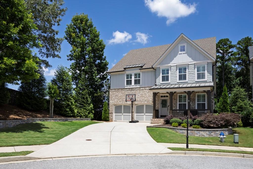 Sought after but seldom available 5 BR/4.5 BA with a MASTER ON MAIN! Situated on a premium cul-de-sac lot, this home is a MUST SEE! Meticulously maintained, this home features, a welcoming front porch, A Foyer, 2-story family room w/stone fireplace and built-in bookcases, Formal dining currently used as an office, spacious island kitchen w/a custom walk-in pantry, Open floor plan, huge loft w/built in cabinets and shelving perfect for a game room, plantation shutters, finished basement w/media room, game room, full bedroom & bath, unfinished area for storage, expanded deck, decks undercover, level fenced backyard w/walking access to lake, custom flooring in garage, beautifully landscaped front yard w/hardscapes. Call today for a quick showing!