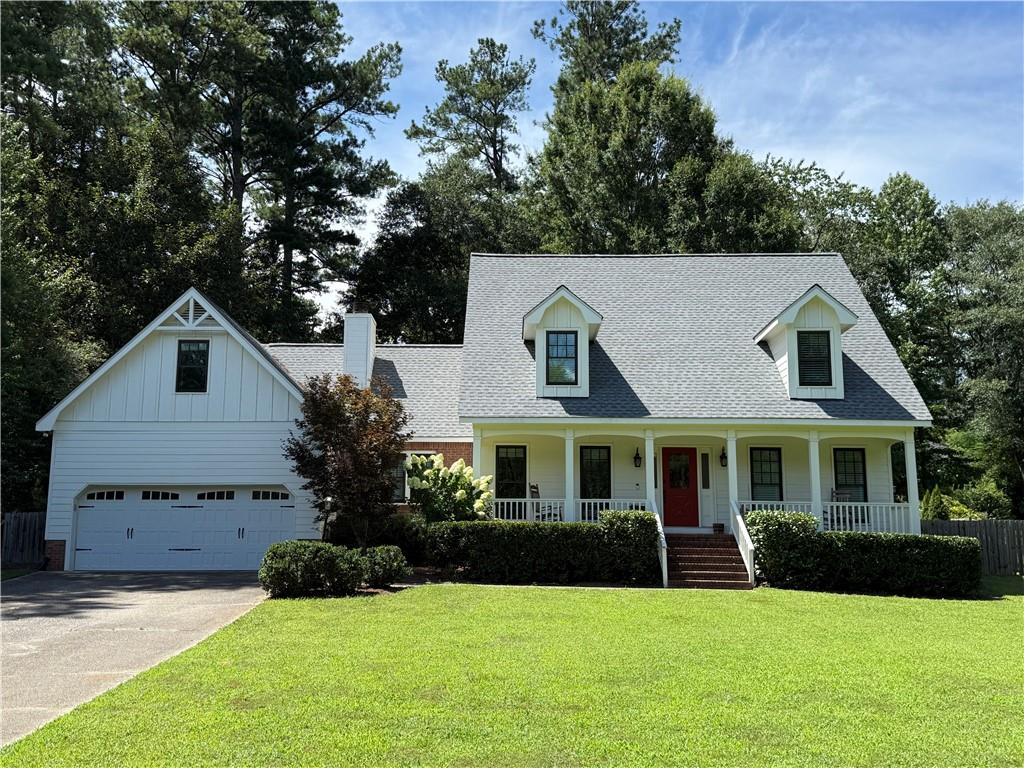 Charming 4BR/3BA Cape Cod in highly sought-after Lee’s Crossing! This beautifully maintained home features an updated kitchen with granite countertops, stainless steel appliances, and custom cabinetry. Spacious family room with vaulted ceiling and gas fireplace. Separate formal dining room with hardwood floors throughout main living areas. Primary suite boasts an oversized master with walk-in closet. Renovated primary bath includes frameless glass shower, and double vanities. Upstairs bonus room offers flexibility for media, office, or playroom. Enjoy outdoor living in the large, fenced backyard with patio space—perfect for entertaining. Roof and main floor HVAC is 2 years old. All windows have been recently replaced. Quiet cul-de-sac location, top-rated Marietta City Schools, and access to community swim/tennis amenities. Just minutes to Marietta Square, parks, and shopping!