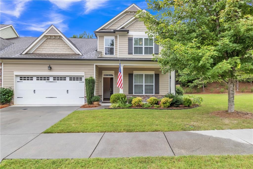 Welcome to River Knoll, Dahlonega’s premier 55+ community where an opportunity to own a home is rare! This meticulously maintained, remodeled attached residence offers 4 spacious bedrooms and 3 bathrooms, making it perfect for comfortable living and entertaining. Step through the front door onto stunning hardwood floors and enjoy the airy feel provided by high ceilings throughout. The oversized primary suite features a bath with dual vanities, granite counters, a large tile shower, and a generous walk-in closet. The chef’s kitchen is a true showstopper, complete with granite countertops, stainless steel appliances, a 6-burner gas range, ample cabinet space, and a walk-in pantry. Gather with friends and family in the inviting living area by the gas-log fireplace with electric igniter, or relax in the adjacent sunroom while taking in views of your private, fully fenced backyard from the expanded patio. Located on a quiet cul-de-sac and featuring a beautiful garden, this energy-efficient home combines luxury and practicality in a highly sought-after neighborhood. Located a short drive from the Historic Downtown Dahlonega Square, hiking trails, wineries and shopping. This home's location is the perfect springboard to mountain living and lifestyle. Don’t miss your chance to join this welcoming community—schedule your private tour today!