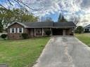 Large ranch-style home with lots of character! This home offers double closets in each bedroom, fresh carpet throughout, new stove, large kitchen area, massive front yard perfect for play-time, and washer and dryer are included! Dont let this opportunity pass you by!