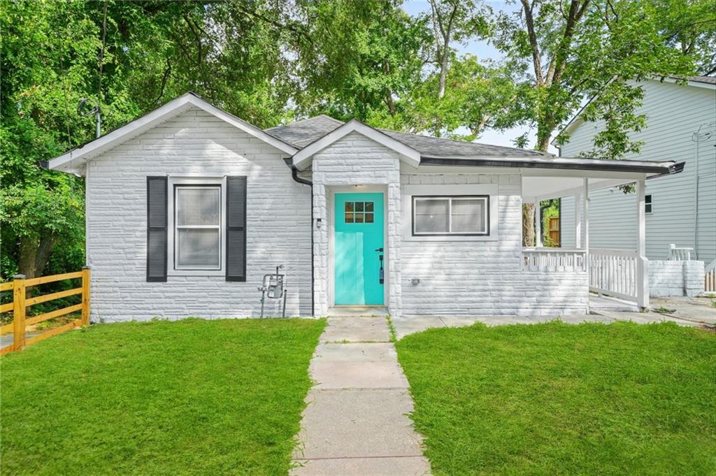 Welcome to 30 Johnson Road NW, a charming 4-bedroom, 3-bath bungalow in Atlanta's thriving Westside, just 4 minutes from the new Westside Park and moments from the BeltLine. This versatile home features three bedrooms and two full baths on the main level, plus a fully finished walk-out lower level with a private entrance, kitchen, bedroom, and full bath-perfect for multi-generational living, separate living quarters, or rental income. With no HOA and a fenced yard, it's an excellent opportunity for investors seeking Airbnb potential or buyers looking for multifamily flexibility. The seller has added a valuable upgrade with a full crawl space encapsulation, paired with a top-of-the-line AquaStop Air System—an advanced dehumidification and filtration system. This premium upgrade not only enhances the home’s air quality and efficiency but also comes with a transferable lifetime warranty, giving the buyer lasting peace of mind. Located near top-rated schools, a Baptist church, MARTA transit, and surrounded by new developments, this home offers in-town convenience, strong investment upside, and easy access to highways, Buckhead, and Midtown. Don't miss your chance to own a truly adaptable property in one of Atlanta's fastest-growing neighborhoods!