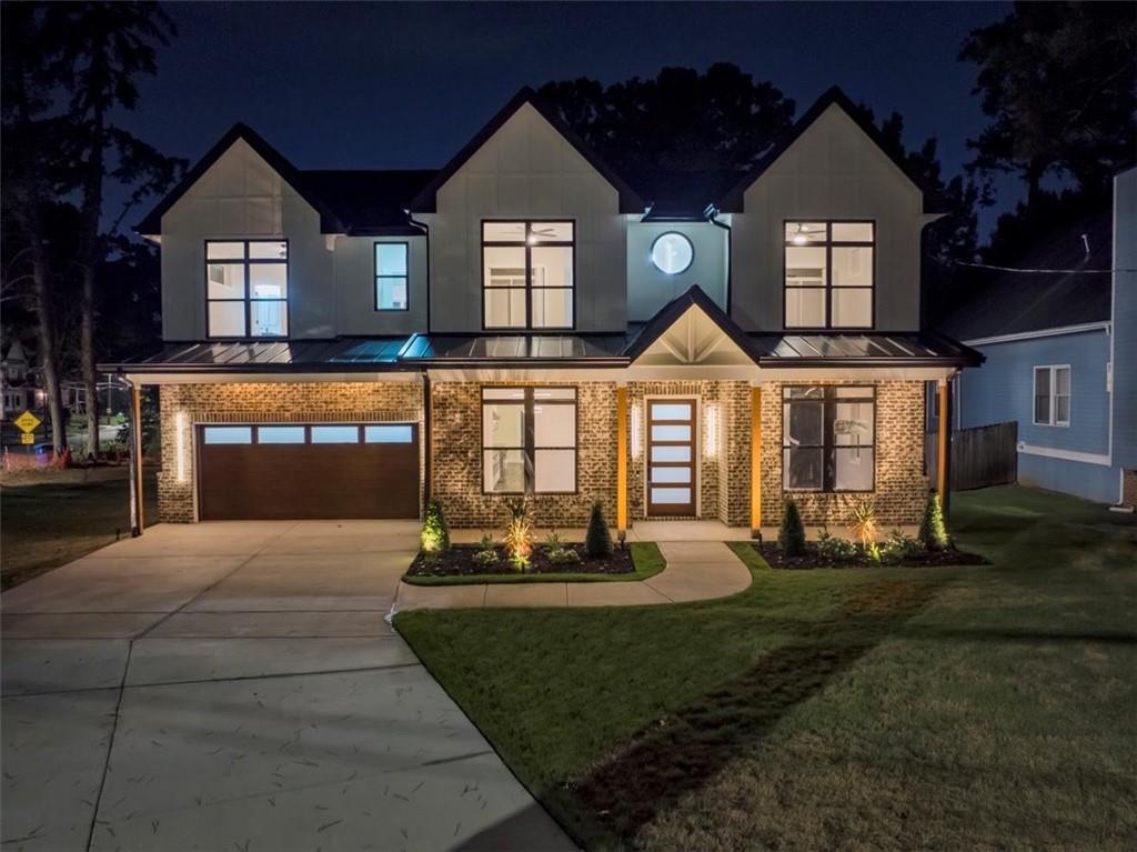 Step into exceptional design and peak luxury with this custom new construction modern farmhouse by Khari Custom Homes featuring Smart Home upgrades in one of Atlanta’s most sought-after locations. Offering 5 bedrooms, 4.5 bathrooms, and two levels of spacious living, this home is designed for both comfort and high-end entertaining. This exquisite residence boasts three master suites, including one on the main level with a full bathroom and two additional master suites upstairs. The open floor plan is flooded with natural light and welcomes you with a grand two-story foyer, separate formal living/office, and elegant dining room. 10 ft. ceilings on the main level with 8 ft. doors. The chef’s dream kitchen is a showstopper, complete with smart appliances, kitchen island, stone countertops, a deep sink, LED under-cabinet lighting, and striking black & gold accents, walk in pantry. The kitchen flows seamlessly into the family room with a cozy fireplace and a keeping room overlooking a covered patio and large private backyard—ideal for entertaining. The upper level features four spacious ensuite bedrooms, three full bathrooms, and a large media/bonus room that can be used as the 6 bedroom, perfect for a home theater, office, or additional indoor recreation. The luxurious owner’s suite offers a private retreat with a huge custom California-style closet, double vanities, a walk-in frameless shower, and an elegant soaking tub. Designed for modern convenience, this home includes laundry rooms on both levels and stunning walnut hardwood floors throughout. Situated on a large corner lot with no HOA, the exterior is just as impressive as the interior, offering masterfully crafted finishes, raised back porch with the patio and pergola. Security system. Located just minutes from the Atlanta BeltLine, Mercedes-Benz Stadium, Georgia Aquarium, Coca-Cola Museum, public library, golf course and top downtown entertainment & dining, this home is at the center of it all. Easy access to I-20, Marta, and less than 20 minutes from Hartsfield-Jackson International Airport and Stone Mountain park. Experience the perfect blend of sophistication, elegance, and functionality. This is a rare opportunity to own a one-of-a-kind luxury home in the heart of Atlanta.
