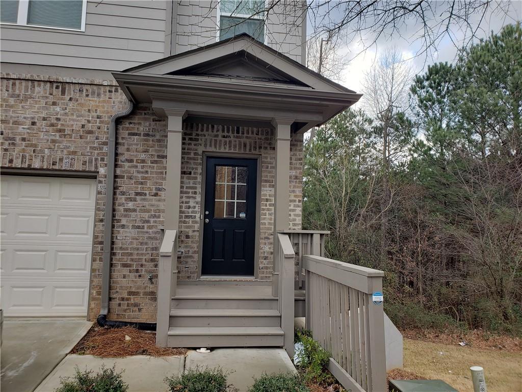Excellent townhouse living in good location. Main floor has faux wood floors, open family room to kitchen, deck overlooking treeline on main floor, unfinished basement for storage, 3 bedroom up, with spacious master bedroom, one car carage with driveway for additional parking. Convenient to shops, restaurants and good schools. This community allows only 2 cars per unit.