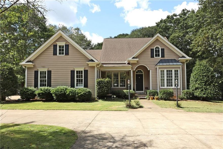 3+/- gorgeous Alpharetta acres with low Cherokee taxes and excellent schools! Bring your horses or car collection! Detached workshop/garage, RV hookup & dump, prewired for a generator. High speed business internet. Beautiful pasture & gardens, nothing missed! This one story home features a total of 5 bedroom suites, eat-in kitchen open to the breakfast room. Separate formal dining room and fireside great room. 2-car attached garage has easy access to the kitchen. Lower level has a full bedroom & bath, family room and storage. Property is gated and fenced. Use Google maps, not Apple maps for GPS. Huge Fenced with water sprinkler installed farm area gas cook top installed in 2023. New refrigerator, washer dryer unit installed in 2023. Newly furnished guest room, hall and buffet area in the basement.