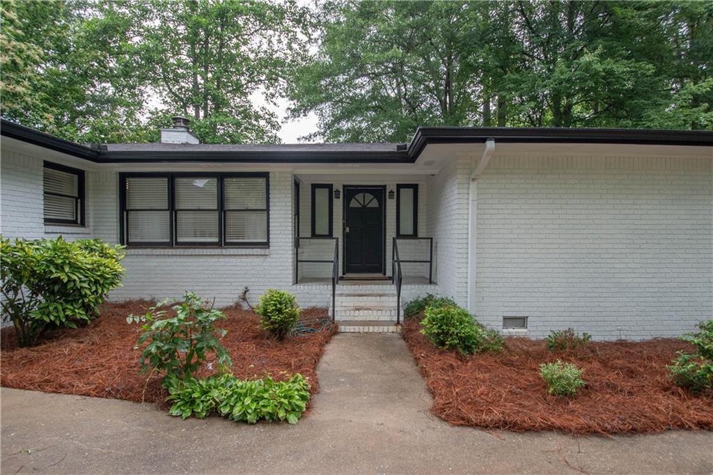 PREFERRED LENDER IS OFFERING AN ADDITIONAL $2000 AT CLOSING*** Charming Updated Farmhouse on 5+ Acres - Mini Farm Near Serenbe & Cochran Mill Park! Welcome to your dream country retreat! Nestled on over 5 picturesque acres, this beautifully updated 3-bedroom, 2-bath all-brick farmhouse offers the perfect blend of rural charm and modern comfort. Located just minutes from the sought-after Serenbe community and Cochran Mill Park, and with convenient access to South Fulton Parkway, this property provides the ideal balance of seclusion and accessibility. Step inside to discover a light-filled, open concept living area featuring sleek stainless steel appliances, a cozy wood-burning stove, and elegant updates throughout. The home offers low-maintenance living in a classic farmhouse setting. Outside, you'll find everything you need for a mini farm lifestyle - a fenced backyard, outdoor shed, and plenty of space for farm animals or a master garden. With road frontage on two sides, this property offers flexibility and convenience for access or potential expansion and potential use as an Air bnb! Whether you're looking for a private homestead, a small-scale farm, or a peaceful escape close to nature and community, this one-of-a-kind property has it all. Call today for an appointment to view! Preferred lender Frank Bennett with Element Home Loans is offering a $2000 lender credit at closing to approved buyers!