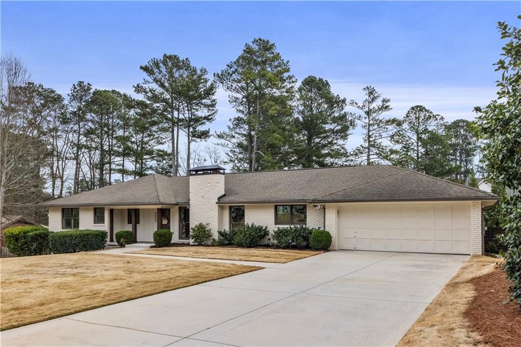 Photo of 4855 Lansbury Drive, Atlanta, GA 30342 (MLS # 7727767)